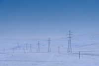 Power lines, electric grid in the cold of winter